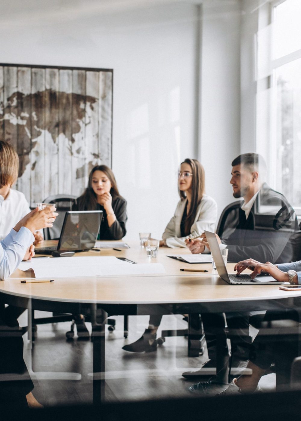 Group of people working out business plan in an office